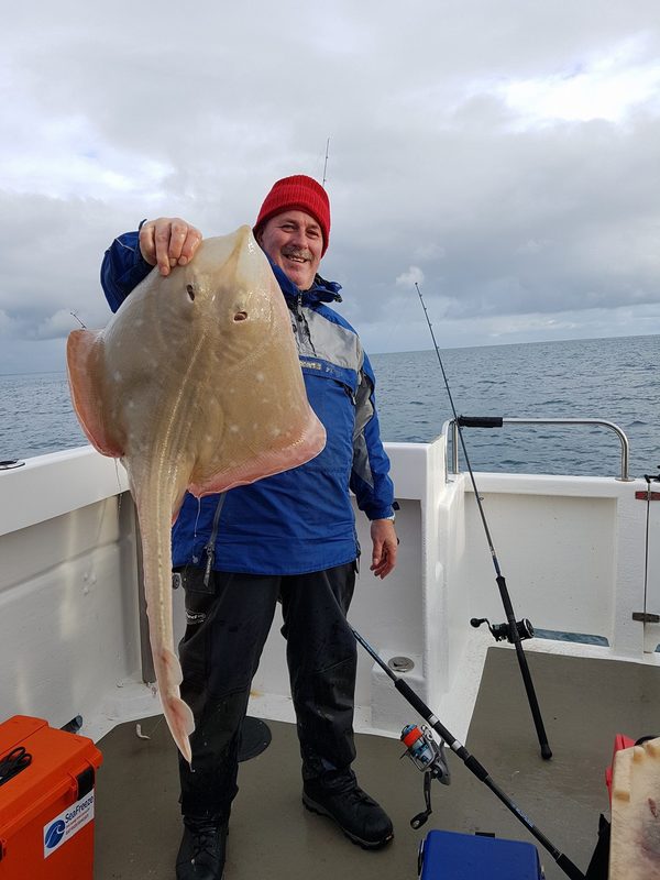Stewart Grey with a huge Small Eyed Ray of 15lb 2oz caught on Bite Adventures Fishing Trips