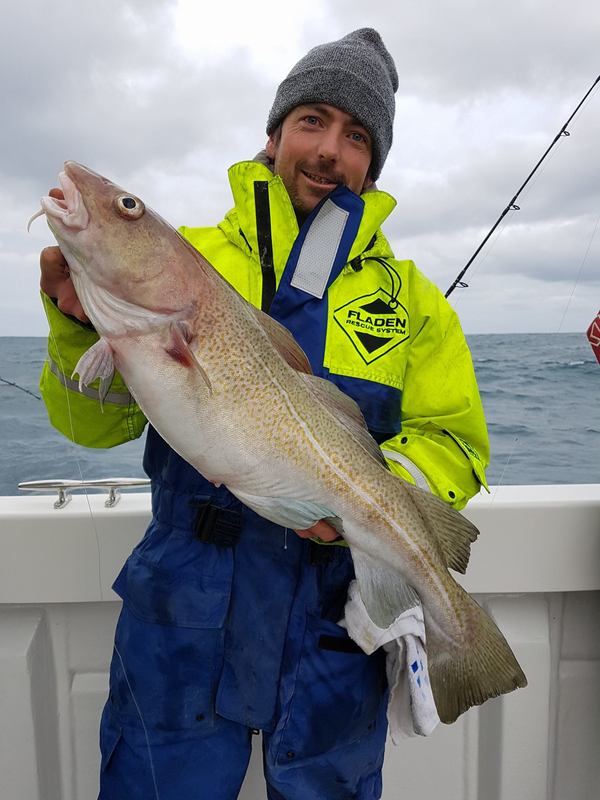 Darryl with a nice 9lb Cod caught on a fishing trip on Bite Adventures