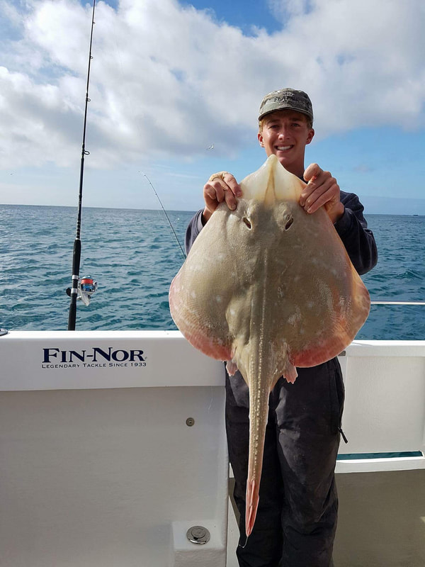 Kieren with a new boat record 14lb 12oz Small Eyed Ray